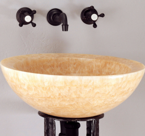 Beveled round polished stone sink by Stone Forest