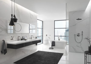 Universal design with wall mounted sinks and Roman, roll-in showers
