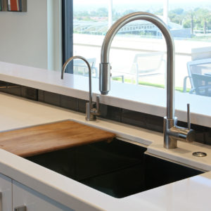 Luxury kitchen faucet and sink on display at the Immerse Showroom