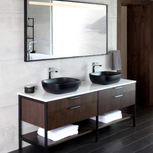 double sink vanity and mirror on display at the immerse showroom in st louis