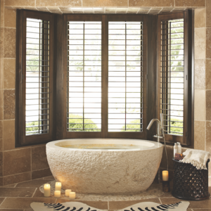 crema marfil tub in luxurious designed bathroom space