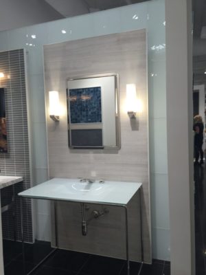luxury bathroom vanity, sink, and faucet on display at the immerse showroom in st. louis