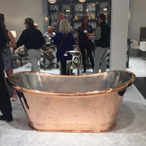 free standing bath tub on display at the immerse gallery showroom in st. louis