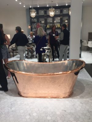 free standing bath tub on display at the immerse gallery showroom in st. louis