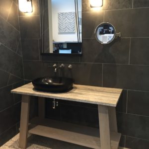 luxury mirror, alape sink and faucet on display at the immerse showroom in st. louis