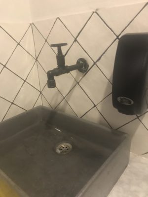 bathroom sink and faucet on display at the immerse showroom in st. louis
