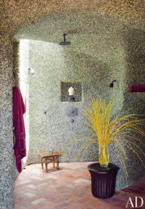 Inlaid pebbles in master bathroom shower space