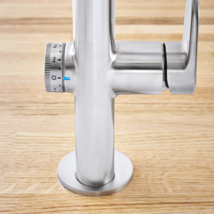 close up of delta faucet on display at the immerse fixtures showroom in st. louis