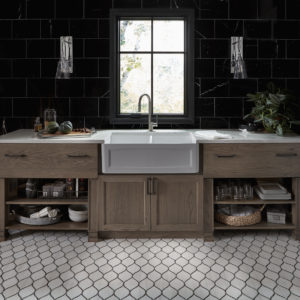 luxury farmhouse sink and faucet on display at the immerse showroom in st. louis