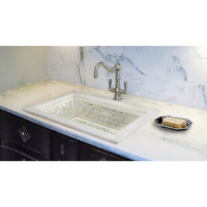 marble kitchen vanity and floral inlay sink on display at the immerse showroom in st. louis