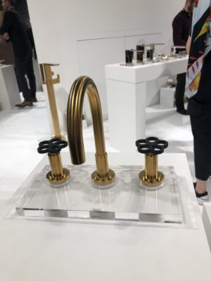bronze designer kitchen and bath faucet on display at the immerse gallery in st. louis