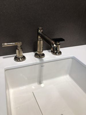 bathroom sink and faucet on display at the immerse gallery showroom in st. louis