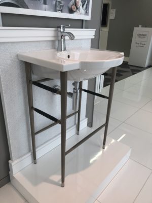 luxury bathroom sink and faucet on display at the immerse fixtures showroom in st. louis