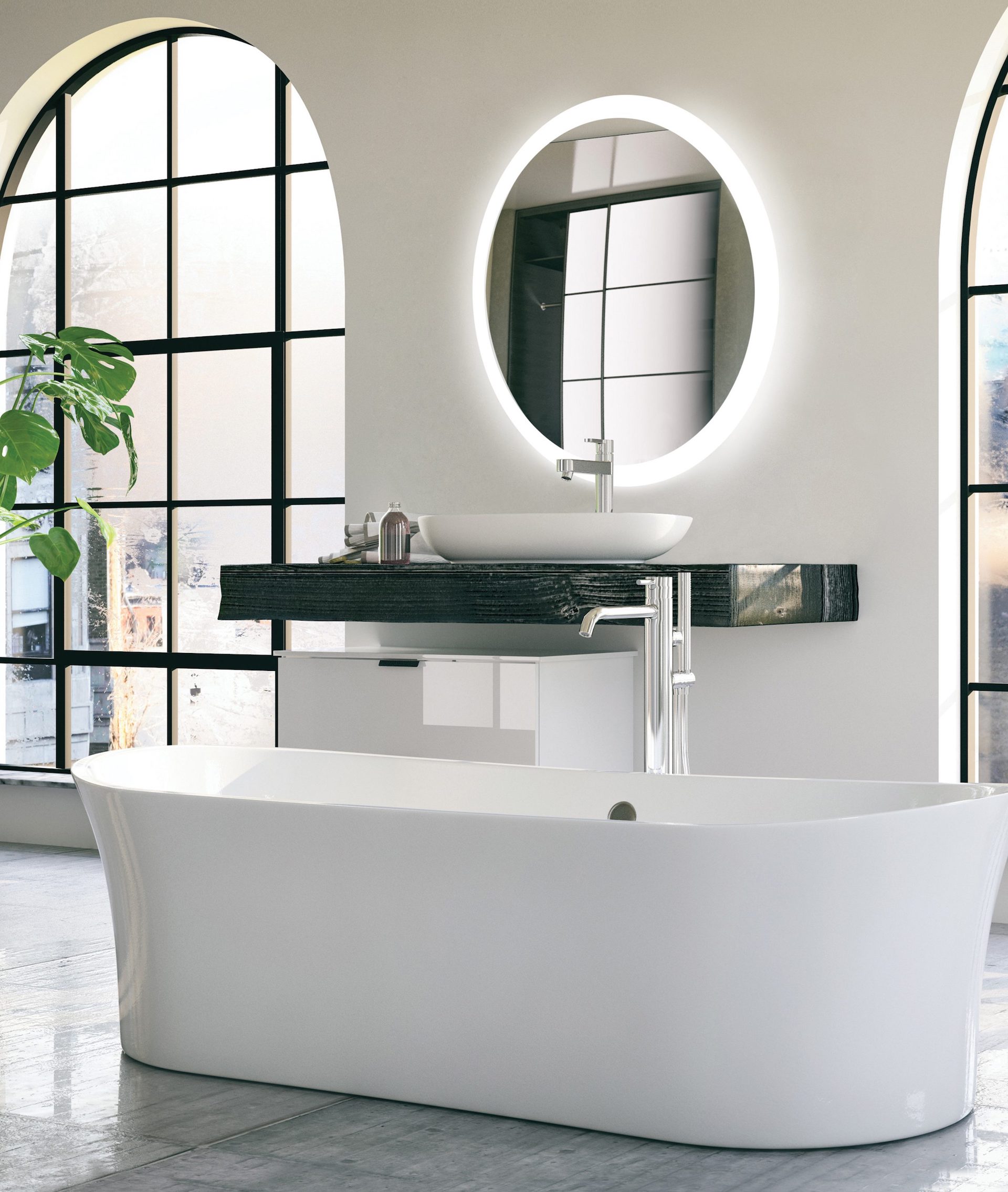 lighted vanity mirror and bathtub on display at the immerse showroom