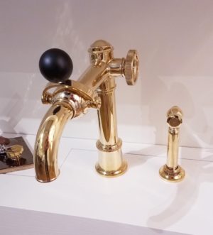 luxury dxv gold faucet on display at the immerse showroom in st. louis
