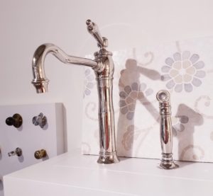 luxury bathroom faucet on display at the immerse fixtures showroom in st. louis