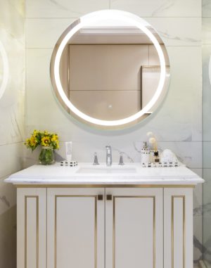 eternity lighted mirror, vanity, and accessories on display at the immerse showroom in st. louis