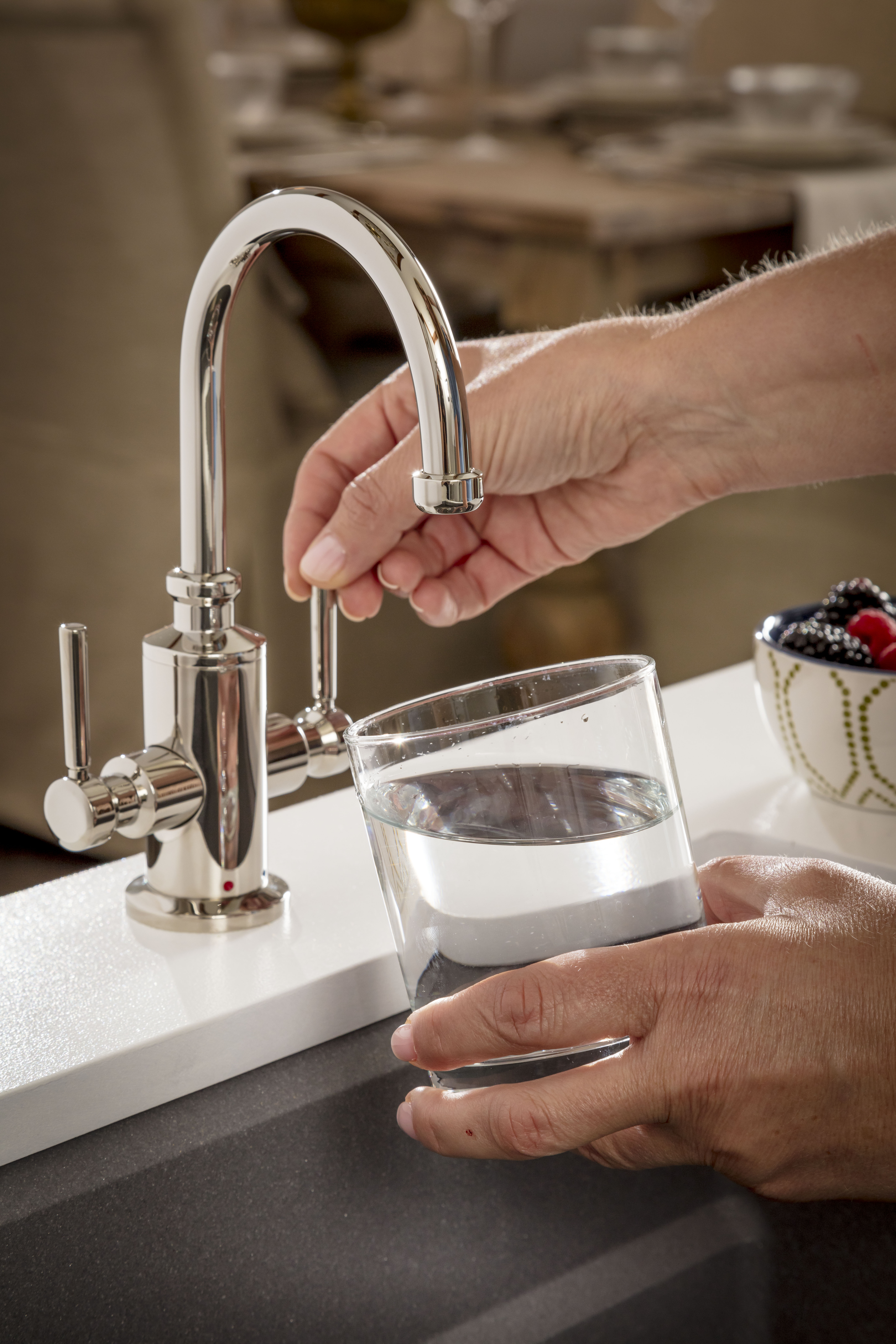 brizo kitchen faucet filling up glass of water