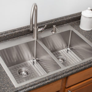 kitchen sink and faucet on display at the immerse supply showroom in st. louis