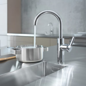 kwc kitchen faucet filling up pot in designed space