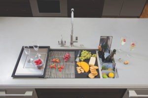 immerse's franke sink accessory holding food and drinks