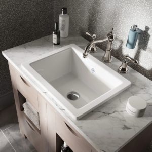 luxury faucet and stoneforest sink at the immerse product showroom gallery