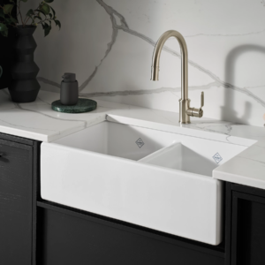 luxury kitchen sink and faucet displayed at the immerse showroom in st. louis
