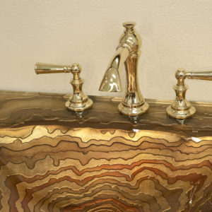 luxury faucet with ronbow sink at the immerse bathroom supply showroom