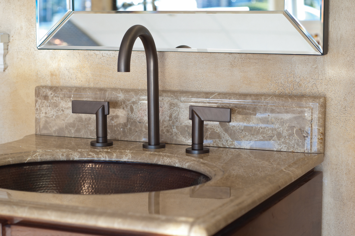 luxury faucet and sink at the immerse bathroom showroom in st. louis