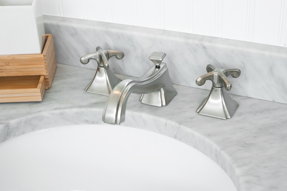 designer faucet at the immerse bathroom showroom in st. louis