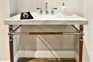 high end faucet and vanity at the immerse kitchen and bath showroom