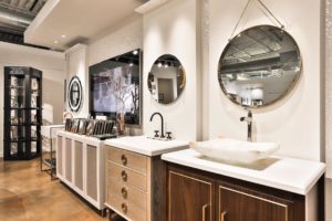 mirrors, faucets, and vanities at the immerse supply showroom
