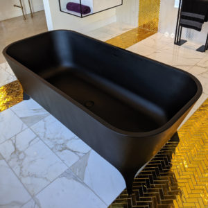 black bathtub at the immerse showroom in st. louis