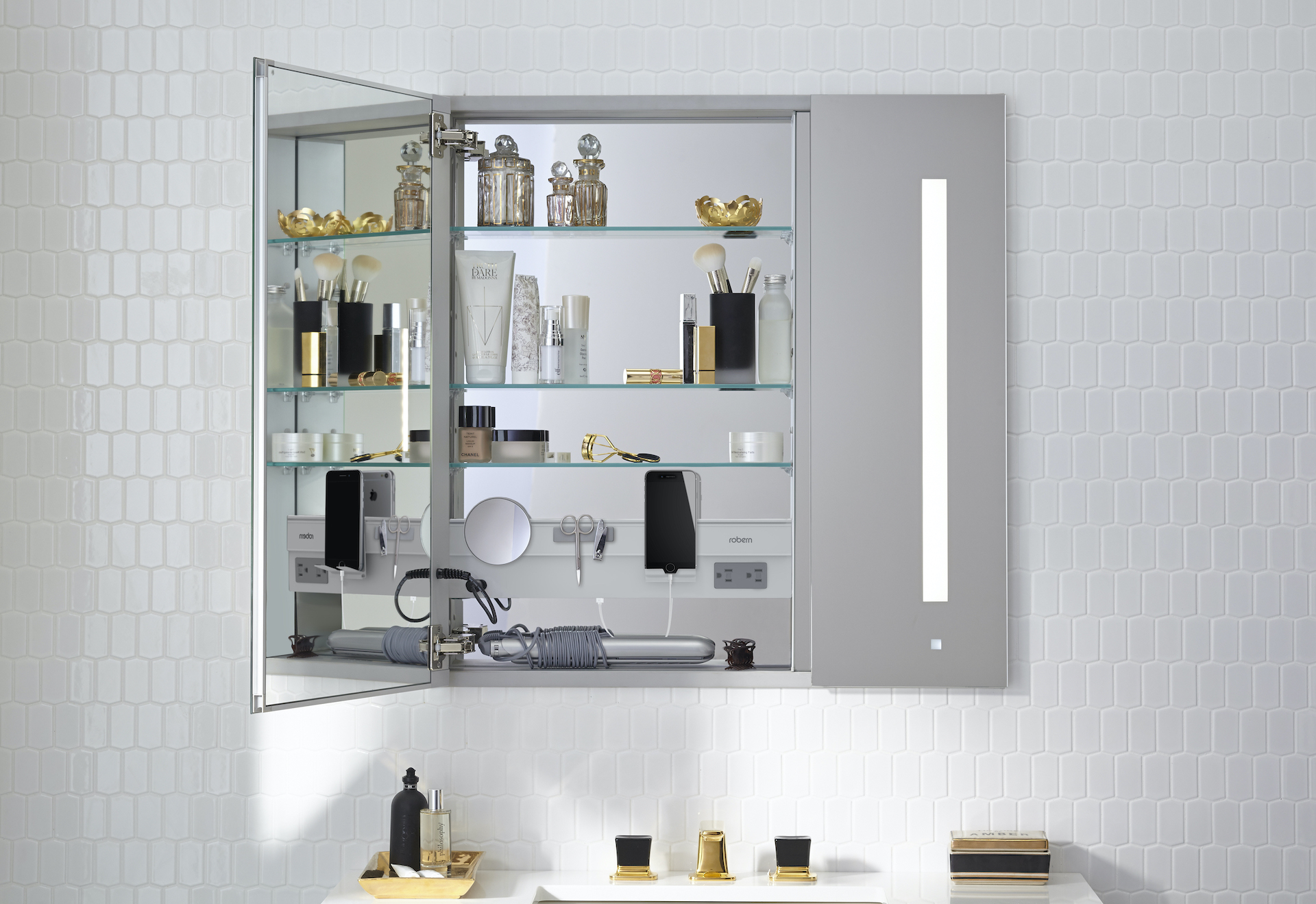lighted bathroom mirror and accessories on display at immerse
